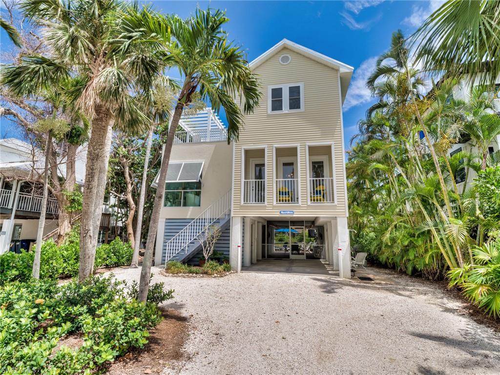 The popularity of this 3/3 Key West-style home, the Sun & Moon, may place it in the top tier of Captiva rental houses, with over 100 VRBO guests rating it as exceptional.  It is easy to maintain and prepare for incoming guests.  Early 2027 advance reservations are booked into April, and many are multi-year repeat guests.  The house is very well furnished and equipped for guest or owner's use.  The metal roof was replaced in 2020.  StormSmart installed new impact windows in 2021, and the heated pool has been resurfaced. To avoid disturbing guests, showing requests can only be approved on Saturdays between departing and incoming guests, with 12 to 2 pm suggested.  Closing date not requested before January 1, 2027. Future guest reservations must be honored.  Any advance or final rental payments for reservations shall be credited to the buyer at closing.