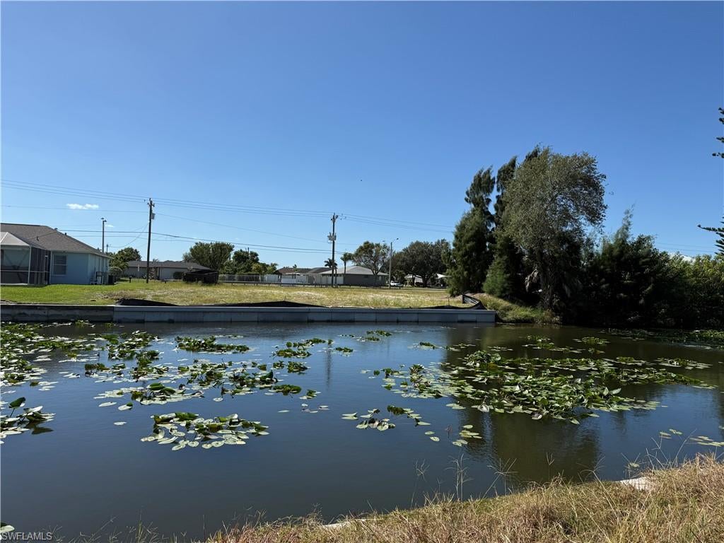Priced right and seller's ready to sell! Beautiful residential lot overlooking the Barkentine fresh water canal. Southern exposure, offering a beautiful back drop your new dream home. Desirable SW Cape Coral area, close to schools, shopping, and offers very easy access. City water & city sewer available. Extra savings, concrete seawall already installed. Grab your piece of paradise before it is gone!