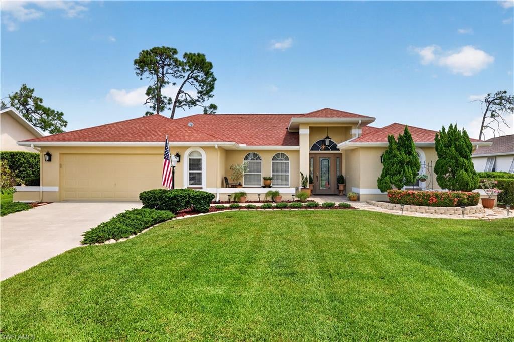 Updated pool home with golf course views, centrally located in Eagle Ridge on the 10th fairway. This single-owner residence has been fantastically maintained with new HVAC (2026), a kitchen makeover (2025), LED lighting, PEX plumbing, and primary bathroom remodel. Pride in ownership is apparent from the moment you pull in the driveway, with manicured garden beds, re-sodded yard, fresh paint and a newer garage door with 120 MPH wind rating. Inside you'll find Hunter Douglas window treatments, oak hardwood in the bedrooms and tile flooring throughout the main living areas. The primary suite--separated from the main living areas and guest rooms--has sliding glass doors to the lanai, walk-in closet and gorgeous ensuite bathroom with frameless glass enclosure, soaking tub, and custom cabinetry with quartz countertops. Across the home, a spacious kitchen with granite countertops, refinished cabinetry with shaker style doors, induction cooktop, dual zone wine fridge, and island seating welcomes guests to gather. Entertain easily with the pass-through window and sliding glass doors that lead to the reinforced pool deck with new pool cage (2018), brick pavers and a brilliantly hidden drain line. There are three guest bedrooms and one full guest bath with pool access, perfect for guests and parties. Built in 1994 by Oyster Homes and equipped with Bahama Shutters in 2009 so it's move-in ready and storm-ready. And the best thing? Eagle Ridge is OUT OF THE FLOOD ZONE (X Zone) so you don't need costly flood insurance! Schedule your showing today!