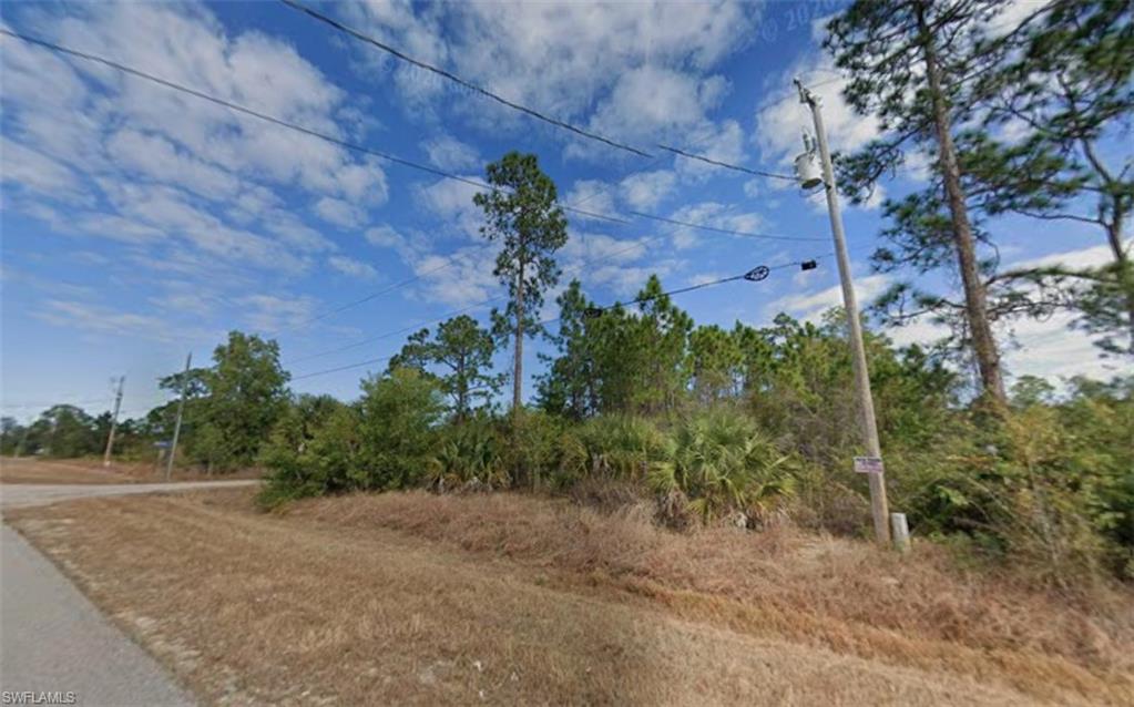 Build your dream home or investment property on this .25-acre CORNER LOT located in the fast-growing and highly desirable community of Lehigh Acres, just west of Fort Myers. Offering a prime location with direct access from a main road, this square lot provides a convenient layout for future development. You'll enjoy quick access to I-75, local shopping centers, restaurants, schools, and the Southwest Florida International Airport—making everyday living or future resale even more appealing. Whether you're looking to build now or hold for future appreciation, this parcel offers an excellent opportunity in a thriving area of Southwest Florida.