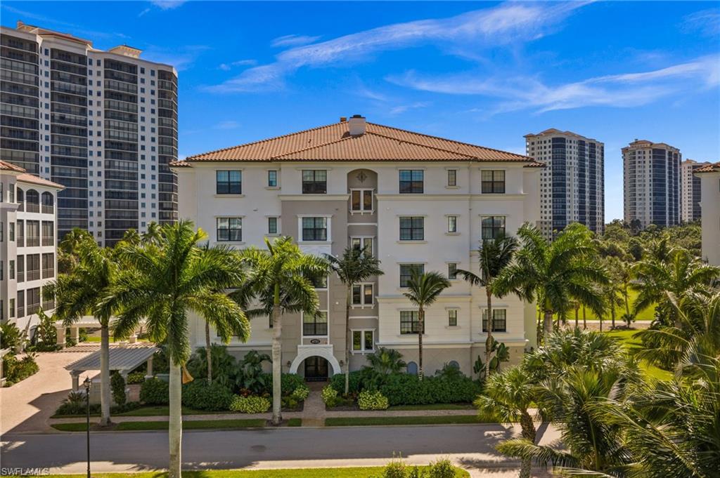 SKIP THE GOLF MEMBERSHIP WAITLIST! Because the current owner is a golf member at The Colony Golf & Country Club, the buyer of this residence can join the club at purchase, with no waiting. Combine that with a premium position on the golf course, directly across from the community pool, hot tub and grills, and this is one of the most compelling opportunities in The Colony.

The elevator opens directly into the residence, setting the tone for a home where thoughtful design and exceptional finishes come together. Sunlight pours through the southeast-facing lanai, with tranquil views of the seventh hole and an ideal vantage point for Southwest Florida’s spectacular winter weather. Inside, designer finishes bring warmth and character throughout, including elegant wallcoverings, tailored window treatments, curated lighting and architectural accents. The kitchen and bar are the heart of the home, featuring Calacatta Oro polished porcelain, dramatic 2.5-inch mitered edges and integrated dining surfaces. Additional details include an oversized sink, touchless faucet, custom beadboard accents, plantation shutters and contemporary pendant lighting. The great room offers understated elegance with custom full-length drapery and Hunter Douglas plantation shutters. A separate office with direct lanai access is an inspiring place to work or unwind. The primary retreat features designer finishes and a customized walk-in closet with enhanced storage and keyless security. Beautifully finished guest accommodations, a stylish powder room and an upgraded laundry room complete the interior. Parking includes an indoor space, a designated outdoor space and private garage storage with keypad access.

Life at The Colony offers experiences rarely found in one destination. Spend an afternoon on the community’s exclusive island beach, arrive by boat for a memorable escape, enjoy waterfront dining at The Bay Club or stay active with tennis, pickleball, bocce, fitness facilities, canoeing and kayaking. Golfers can skip the line and tee it up at The Colony Golf & Country Club.

Coconut Point’s shopping and dining are minutes away, and Southwest Florida International Airport is approximately 15 miles away. Golf membership without the wait is a rare opportunity. Don’t miss your chance.