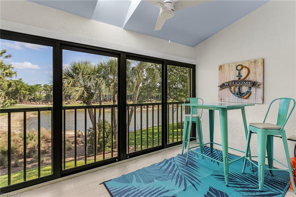 MOTIVATED SELLER! Welcome to your slice of Southwest Florida paradise! This high-and-dry, 2nd-floor, turnkey furnished 2-bedroom, 2-bath condo in the prestigious Kelly Greens Golf & Country Club offers the perfect blend of beachside living and country club luxury, just 5 minutes from Sanibel Island, Fort Myers Beach, and endless dining and shopping. Inside, you'll love the soaring 13' cathedral ceilings, updated kitchen and bathrooms, sleek tile flooring throughout, a custom wet bar perfect for entertaining, and what might be one of the best views in the community. Two spacious lanais let you enjoy the best of Florida living, with an enclosed front lanai featuring eastern exposure for peaceful morning coffee and a rear lanai overlooking the golf course and lake—the ideal setting to relax with a sunset cocktail—complete with hurricane-impact windows and sliders for added peace of mind. Additional highlights include a private 1-car enclosed garage and outstanding value with HOA fees that include bundled golf and country club membership, water, cable, internet, and exterior insurance. Enjoy a 72-par championship golf course designed by Gordon Lewis, putting green and practice range, tennis, multiple pools and hot tubs, scenic walking and bike paths, resort-style amenities, all in one of Southwest Florida's most desirable locations. Whether you're teeing off or putting your toes in the sand, this home is truly a hole-in-one.  Association is financially healthy in this building!