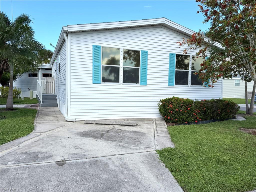 Discover Your Dream Home in Riverwoods Plantation - A Premier 55+ Mobile Home Community in Estero, FL! Welcome to this incredible 1999 Home of Merritt mobile home, nestled on an oversized corner lot with a partial lake view in the desirable Riverwoods Plantation. This spacious two-bedroom, one-and-a-half-bath residence offers a unique blend of comfort and lifestyle in an active adult community. Step inside to find a desirable layout featuring new appliances, NEW AC, and laminate flooring in the living room and kitchen, new roof in 2023. With ample storage, including a large utility room, this home is perfect for those looking to downsize without sacrificing space. Riverwoods Plantation offers a vibrant community feel, where you not only own the land you live on but also enjoy an array of exceptional amenities. With an on-site property manager and activity director, you will never run out of fun things to do! Engage in a variety of recreational activities such as sand and water volleyball, pickleball, tennis, bocce, horseshoes, and shuffleboard. Enjoy special events, exercise classes, water aerobics, and live music from talented bands right in your community! For the creatively inclined, there are quilting and craft classes, along with fun social activities like line dancing and card games. Residents also appreciate the community breakfasts and engaging guest speakers. One of the standout features of Riverwoods Plantation is its unique riverfront property, allowing residents to store water toys such as boats, kayaks, and canoes. The convenient boat ramp provides direct access to the Estero River, leading to the beautiful Estero Bay and the Gulf of Mexico. Conveniently located near the airport, shopping centers, stunning beaches, and restaurants, this home is perfect for those seeking an active lifestyle in a peaceful and welcoming environment. Don’t miss this amazing opportunity to call Riverwoods Plantation your home!