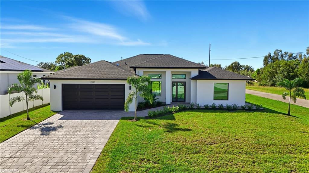 Discover the perfect blend of modern luxury and family-friendly functionality in the St. Lucia, one of our most sought-after floor plans. Situated on a highly desired corner lot, this home offers added curb appeal, extra outdoor space, and enhanced privacy—making it a standout in any neighborhood.
With 4 bedrooms, 3 full bathrooms, plus a private den, this 2,230-square-foot home is designed with today’s multigenerational lifestyle in mind. Step inside to soaring ceilings, an open-concept great room, and a chef-inspired kitchen featuring a large waterfall edge island, designer cabinetry, and luxury finishes throughout.
A private in-law suite with its own entrance, kitchenette, and full bath provides the perfect retreat for guests, extended family, or even an income-producing opportunity. Every inch of the St. Lucia is loaded with premium upgrades, from impact-rated windows and doors to elegant tile floors, quartz & granite countertops, and upgraded lighting fixtures.
Whether entertaining in the spacious living area, working from the quiet den, or relaxing on the covered lanai, the St. Lucia embodies the best of Southwest Florida living—style, comfort, and versatility.