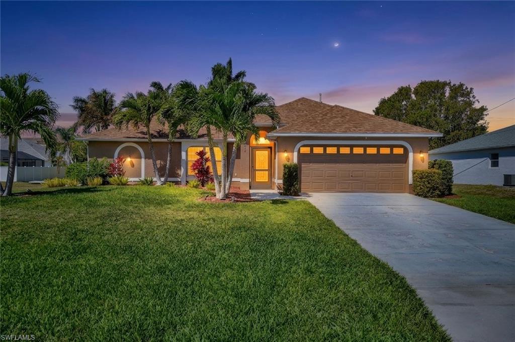 Turnkey Florida living with a west-facing salt water pool! This tastefully decorated, beautifully updated split-bedroom home offers comfort, style, and convenience in Cape Coral. Hurricane impact windows add peace of mind, and the well-kept yard features lush landscaping with an irrigation system. Unwind or entertain by the pool in your private outdoor oasis. Perfect as a primary residence, second home, or income-producing rental, and close to Cape Coral's dining, shopping, and entertainment. Schedule your private showing today!