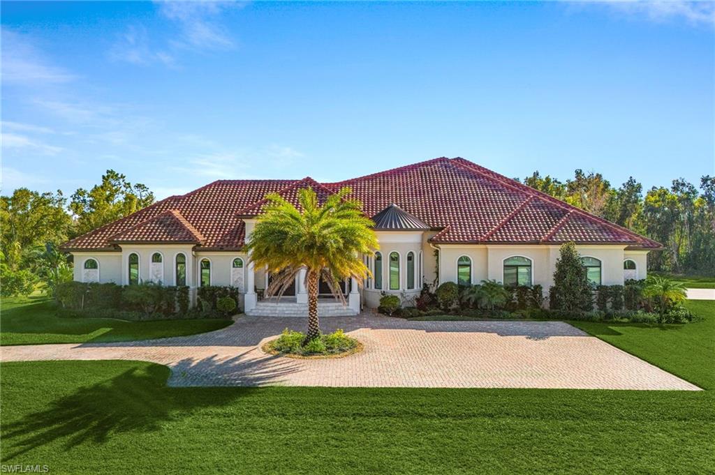 Welcome to 8250 Penzance Boulevard, Fort Myers, Florida—one of the newest luxury estates built in the prestigious Daniels corridor. Completed in 2022, this exceptional residence is set on nearly five private acres, offering an extraordinary combination of luxury, privacy, and convenience in one of Lee County's most sought-after locations.
With nearly 6,000 square feet of thoughtfully designed living space, every detail has been crafted for comfort and entertaining. The stunning chef's kitchen is the heart of the home, featuring two oversized islands, premium finishes, and a hidden walk-in pantry that blends functionality with elegant design.
The luxurious primary suite is a true private retreat, complete with his-and-hers spa-inspired bathrooms, custom walk-in closets, and a private morning bar with a microwave and refrigerator for added convenience.
Designed with entertainment in mind, the fully wired media room is ready for an immersive home theater experience and is currently enjoyed as a game room. Step outside to your own private resort, where an expansive lanai surrounds the custom walk-in pool and an air-conditioned outdoor kitchen, creating the perfect setting for year-round Florida living.
Despite its peaceful, secluded setting, this estate is remarkably convenient. Southwest Florida International Airport is just 10 minutes away, while Whole Foods, upscale shopping, fine dining, entertainment, and everyday essentials are all within minutes.
For golf enthusiasts, The Club at Renaissance is just 1.26 miles away—an easy walk or quick golf cart ride—and offers one of Southwest Florida's premier private club experiences with outstanding membership opportunities. On your way home, stop by nearby Fresh Farms for locally grown produce or enjoy a handcrafted beer from their small-batch brewery.
Opportunities to own a modern estate offering this level of privacy, acreage, luxury, and unmatched location are exceptionally rare. Experience the Southwest Florida lifestyle at its finest and discover everything 8250 Penzance Boulevard has to offer before this remarkable property is gone.