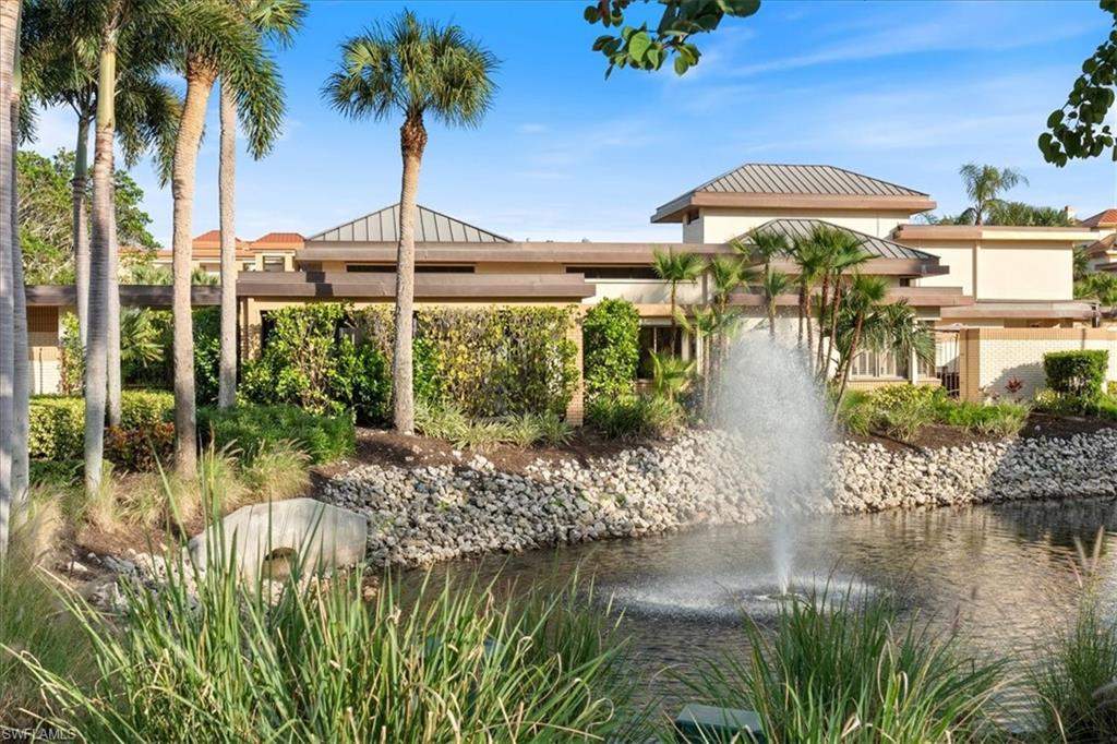 Seller says unit has never flooded! in X500 flood zone! Exceptional and rarely available Villa in Pelican Bay – A Serene Oasis with Modern Elegance. Step into this meticulously maintained 3-bedroom villa, where luxury meets tranquility. Recently updated and in pristine condition, this home boasts a newer gourmet kitchen featuring high-end granite countertops, a stunning glass tile backsplash, and all-new top-tier appliances. The porcelain tile flooring throughout adds a touch of sophistication, while a neutral palette of fresh paint creates a warm and inviting ambiance. Relax on the screened porch overlooking a serene pond and lighted fountain, or enjoy the privacy of the walled courtyards accessible from the master suite and third bedroom. The laundry room is thoughtfully upgraded with a granite sink and new under-counter washer and dryer. Even the garage shines with a freshly painted floor, showcasing the attention to detail in every corner of this home. Built for comfort and safety, the villa includes comprehensive hurricane protection with high-impact glass, electric shutters, and manual options. The exterior has also been freshly painted, complementing the well-maintained Interlachen community inspired by the timeless design of Frank Lloyd Wright. Interlachen offers lush landscaping, tranquil water features, a newly renovated swimming pool, decks, and a picturesque bridge. With a new irrigation system in courtyards and an enhanced entry fountain, the community is a reflection of Pelican Bay’s premier lifestyle. Located within walking distance to Pelican Bay’s renowned amenities, residents enjoy the convenience of the berm for walking or biking, tram access to two exclusive Beach Club restaurants, and proximity to two Tennis Centers and a full-service fitness facility. Discover the serene elegance of this villa and the unparalleled lifestyle of Pelican Bay. Schedule your private showing today!