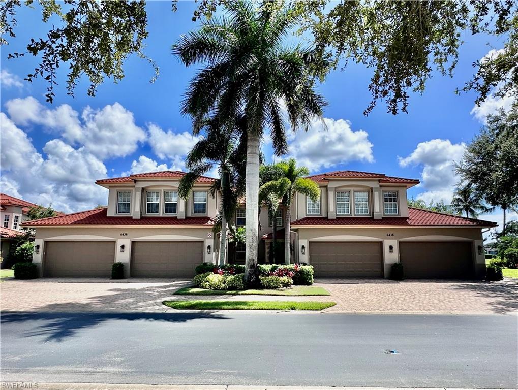 This one is a WOW! RENOVATED and stunning END UNIT 2nd floor 3BR/Den/3BA/2 Car Garage with a PRIVATE ELEVATOR and absolutely stunning and endless lake & golf course views! This beautiful coach home has over 2,680 sq.ft. of living space, was built in 2007, has high ceilings, has been fully renovated, has hurricane impact glass windows & sliding doors, a new hot water heater, and over $70,000 in further upgrades this year alone. The 3rd bedroom is currently being used as an office and media room, and has a newly renovated full bathroom, and walk-in closet. The Den is currently being used as a private dining room. Many owners have their dining room set up in the Great/Family Room. The Legacy buildings have new roofs (2023) and at this time are all being newly painted outside with a new color scheme. The AC was replaced in 2019. Ownership in Legacy ncludes immediate membership to the award-winning Players Club & Spa which offers five-star resort amenities such as 13 tennis courts, 8 pickleball courts, two tropical resort-style walk-in pools, a gorgeous waterfall, plus a lap pool and Tiki bar by the pools, bocce, a full-service spa and fitness center, and multiple dining options. Golfers have access to 2 public golf courses and the opportunity for a private membership at The Classics Golf & Country Club in Lely. All this is close to Marco Island and their incredible beaches, as well as downtown Naples...5th Ave South and 3rd Street South!