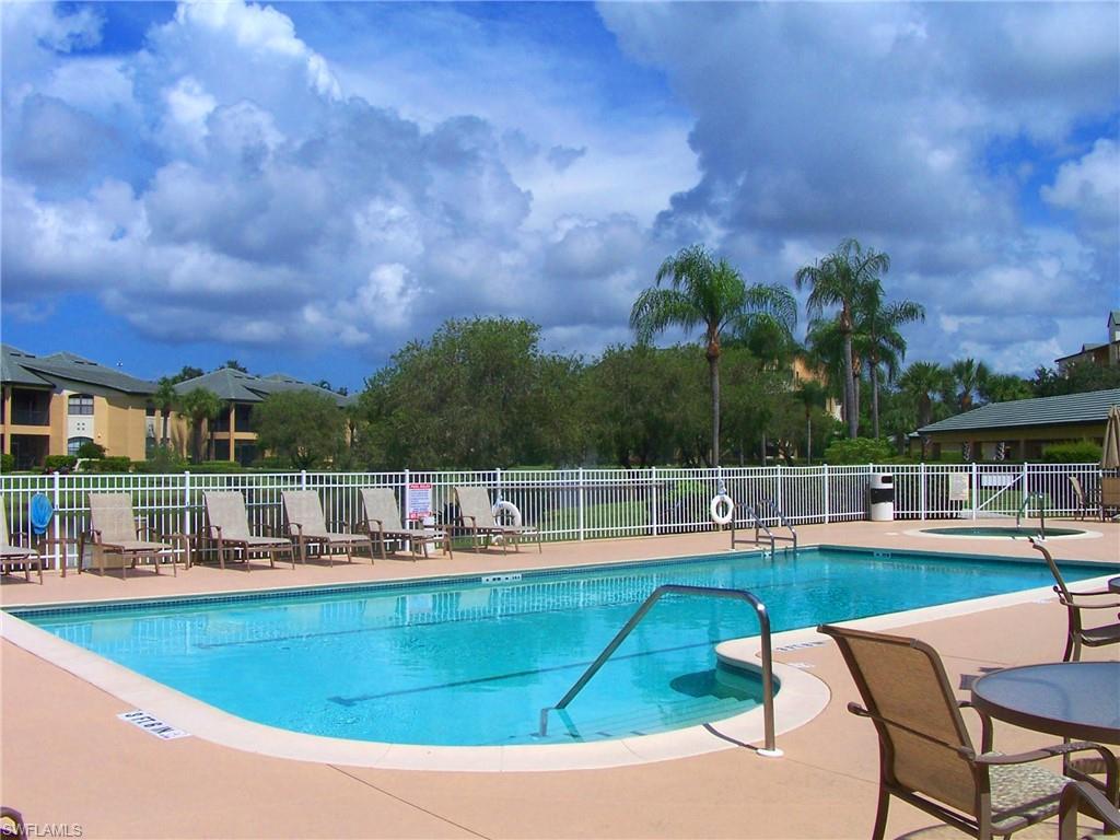 Enjoy your winter getaway in Naples in this beautifully updated 2-bedroom, 2-bath condominium! The inviting living area features comfortable furnishings and a large flat-screen TV. The updated kitchen is fully equipped with modern finishes and everything you need for your stay. The primary suite offers a king-size bed, walk-in closet, flat-screen TV, and direct access to the screened lanai overlooking the golf course and lakes. The guest bedroom features a queen-size bed, with a second full bath for added convenience. A separate laundry room and private driveway add to the comfort of this lovely unit. Relax by the pool, explore Naples’ beautiful beaches, and enjoy the many nearby shopping and dining options. Your perfect Florida escape awaits!