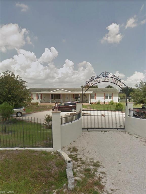 3.75 Acres of Endless Possibilities! Country Living at Its Finest.Seller is contributing up to $10,000 for closing cost.Discover the perfect blend of privacy, space, and country charm at 630 N Coral St, Clewiston, FL. Situated on an impressive 3.75-acre property, this unique estate offers the freedom you've been searching for—whether you're dreaming of a hobby farm, bringing your horses and animals, parking your RVs and equipment, or simply enjoying wide-open spaces away from the city. The spacious 4-bedroom, 2-bath home features over 2,300 square feet of living space, providing plenty of room for family and guests. Step outside and enjoy the peaceful surroundings from the expansive front and back decks, overlooking your private acreage.
The property includes a pond, mature trees, partial fencing, a circular driveway, and three separate 1.25-acre parcels, creating incredible flexibility for future investment, expansion, or resale opportunities. 
If you've been searching for acreage, privacy, and unlimited possibilities, this property is a rare opportunity you won't want to miss. Schedule your private showing today and experience everything this exceptional property has to offer.
