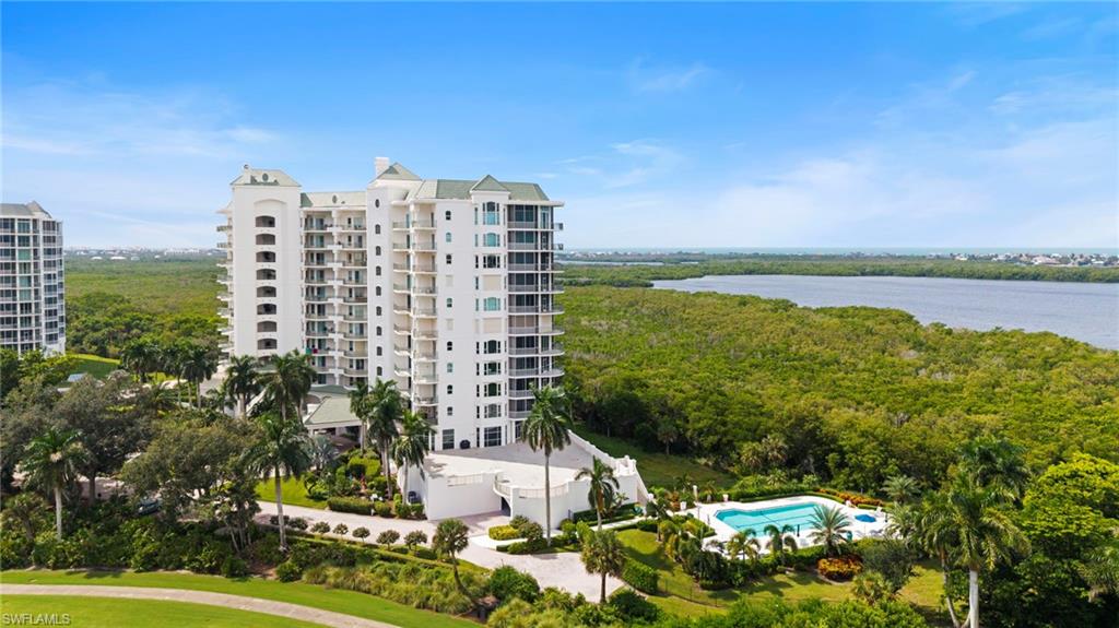 UNMATCHED VIEWS, INCREDIBLE POTENTIAL, AND THE EXCEPTIONAL BONITA BAY LIFESTYLE!  This spacious 3-bedroom, 3-bath residence features panoramic views of the Gulf, Estero Bay, and lush golf course fairways from every room.  The open-concept floor plan offers flexibility for creating your ideal coastal retreat.  Additional features include a new roof,  fresh exterior paint, electronically controlled hurricane shutters, an elevated two-car garage, extra parking and common elevator access.   Building amenities include a fitness center, private pool, game/ gathering room and spacious courtyard.  Within the gated Bonita Bay community, enjoy miles of walking and biking trails, waterfront parks, a marina, and the Bonita Bay Beach Club.  Optional club memberships offer 5 championship golf courses, tennis, pickleball, fitness facilities, spa services, dining, and social activities. Conveniently located near beaches, shopping, dining and Southwest Florida International Airport.  What an extraordinary opportunity to enjoy the views, embrace the lifestyle, and make this residence uniquely yours!
