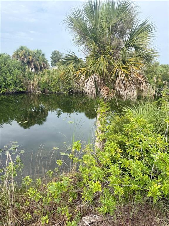 Build your Florida dream home on this beautiful freshwater homesite in one of Cape Coral's peaceful, established neighborhoods! Boasting desirable southwest rear exposure, you'll enjoy gorgeous afternoon sunshine and breathtaking sunsets from your future lanai and backyard. This waterfront lot offers the perfect setting for relaxing, kayaking, fishing, or simply taking in the tranquil water views. Conveniently located near shopping, dining, schools, parks, and everything Cape Coral has to offer, this is an exceptional opportunity to secure your own slice of paradise. Whether you're ready to build now or invest for the future, don't let this affordable freshwater lot slip away!