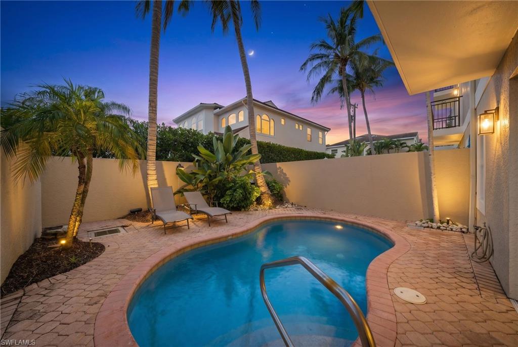 Experience the charm of Olde Naples at Villa Avellino! Ideally located just moments from the renowned shops and restaurants of Third Street South, this spacious 3-bedroom, 4-full-bath villa offers an exceptional coastal lifestyle. Featuring a private pool, private elevator servicing all three levels, generous living spaces, multiple balconies, walk-in closets, and an attached garage, this residence combines the privacy of a single-family home with the convenience of villa living. Enjoy outstanding walkability to Naples' finest dining, boutique shopping, and beautiful white-sand beaches. A wonderful opportunity to enjoy the very best of Olde Naples.