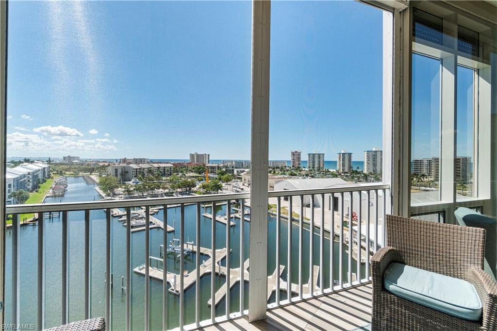 Beautifully renovated PENTHOUSE END-UNIT with spectacular BAY and GULF views nestled on the peaceful South End of Estero Island! INCLUDES A RARE PRIVATE 1-CAR GARAGE! Perfectly situated less than half a mile from Fishtale Marina, where you can store your boat with ease, and the Freedom Boat Club, offering no-maintenance boat rental memberships, this location caters to all your maritime desires. This condo is truly a beach and boater’s haven, providing unmatched access to the vibrant boating lifestyle and is just steps from the pristine sugar sands of Fort Myers Beach. This 3 bed/2 bath coastal contemporary retreat is finely appointed with an open floor plan, hurricane impact windows/sliders, electric hurricane shutters, hardwood and tile flooring throughout, light and bright interior with gorgeous natural lighting, and high ceilings exclusive to penthouse units. Step out onto the spacious lanai—the perfect place to unwind as boats glide by on the bay or as you take in the breathtaking sunset views over the Gulf. The beautifully updated kitchen features quartz countertops, white cabinetry, breakfast bar seating, an eat-in area, and spectacular water views. The well-designed split floor plan offers privacy and convenience, with guest bedrooms and bath situated at the front, while the serene primary suite is positioned on the waterfront side. The primary suite boasts direct lanai access, bay and gulf views, and a spa-like bathroom with dual vanities, a soaking tub, and spacious dual shower. Additional highlights include an on-demand water heater and motorized shades in the kitchen, dining, and primary bedroom. Palm Harbor Club allows for weekly rentals, creating a fantastic opportunity for potential rental income! Residents can also enjoy resort-style amenities such as a large pool, spa, clubhouse, and tennis/pickleball courts.