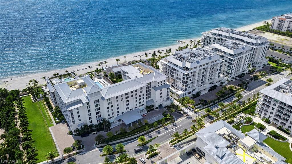 The iconic Naples Beach Club enters a new era with the completion of Four Seasons Residences, an exclusive beachfront enclave redefining luxury living on the Paradise Coast. Originally established by the Watkins family in 1946, this historic destination has been thoughtfully transformed into one of Florida's most coveted residential addresses. This beautifully appointed three bedroom plus study, three and a half bath residence offers extraordinary craftsmanship and effortless elegance, highlighted by soaring 12-foot ceilings, sunlit interiors, a palatial, one of a kind terrace with west-, east-, and south-facing vistas, and spectacular Gulf views. The true VIP guest suite has a private, large terrace as well. The elegant Seashell design palette features white cabinetry, Calacatta marble kitchen countertops and island, blonde white oak flooring, and luxurious Bianco Dolomiti, Nordic Gray, and Vanilla Ice marble throughout the baths. Created by renowned designer Champalimaud, the residence blends timeless architecture and finishes, premium appliances, custom millwork, generous walk-in closets, and private elevator access. Limited to just 58 residences, Four Seasons Naples Beach Club offers an unrivaled lifestyle with a Fazio designed 18-hole golf course, world-class spa and wellness,  six dining venues, 1,000 feet of pristine beachfront, and the legendary Four Seasons service.