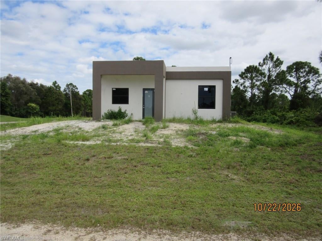 *** INVESTOR ALERT** Outstanding opportunity to own this unfinished new construction home in a desirable Lehigh Acres location! This mostly completed spec home offers the chance for an investor, contractor, or owner-occupant to finish the property to their own tastes and specifications. Situated on a spacious lot, this home has tremendous potential and is ready for the next owner to bring it across the finish line. Whether you're looking for your next investment project or the opportunity to customize your dream home, this property is a must-see. Conveniently located near schools, shopping, dining, and major roadways. Property is being sold AS-IS. Don't miss this unique opportunity!
