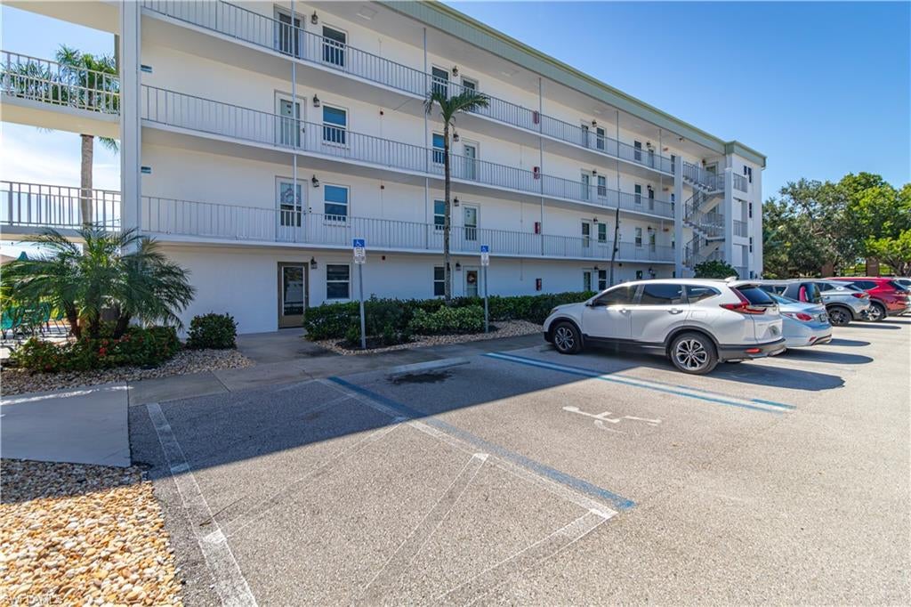 Great Opportunity!!! Priced to sell, in this Golf and Tennis Community!! This 2 bedrooms 1 bathroom condo is offered furnished with just a few exclusions.  The unit has Luxury Vinyl Flooring throughout. Primary Bedroom has double closets.  Storage closet on Lanai and also near the elevators is an additional storage closet.  Impact Resistant Windows in kitchen and bedrooms.  Relax on the lanai that is screened-in with hurricane shutters for your added protection.  Seven Lakes is an active 55+ community where one owner has to be 55 years of age or older. Condo fee covers cable, internet, water, sewer, trash removal, lawn maintenance, owner pays electric. Fantastic Neighbors & an Amazingly Fun Community. Golf with NO GREEN FEES, NO TRAIL FEES. Location is second to None close to Airport, Restaurants and Shopping, Plenty of Local Entertainment Options All around the Block! Tons of amenities in the community, golf - Executive 18 Hole Course where two owners have unlimited golf, 6 Tennis Courts, pickle ball, shuffleboard, bocce ball, an Auditorium for dinners and dancing to name a few. Full Time Recreation Department Puts Out Calendar of Events in monthly Newsletter. Auditorium Hosting Lots of Fun Happenings Too. Private Restaurant & Bar Has Weekly Events like Karaoke and Trivia, Theme Dinners & Happy Hours. 24/7 Guard gate.  Start Living The Seven Lakes Lifestyle!  WONDERFUL COMMUNITY!