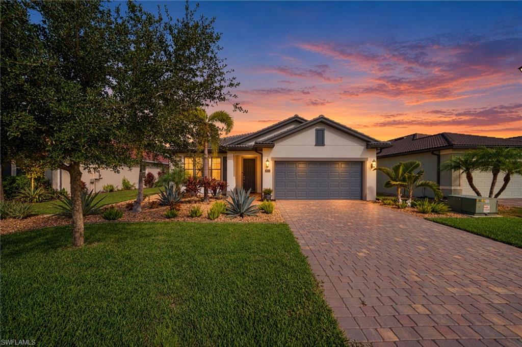 **Beautiful Pool Home with Serene Lake Views in Hampton Lakes at River Hall!**

Discover the perfect blend of comfort, style, and Florida living in this immaculate Pulte-built home, ideally situated in the desirable Hampton Lakes community of River Hall in Alva. Featuring the sought-after Canopy floor plan, this thoughtfully designed residence offers four bedrooms, three full bathrooms, and an inviting open-concept layout ideal for everyday living and entertaining.

The spacious living area flows seamlessly through oversized sliding glass doors to a generous screened lanai and private pool, creating the perfect setting for enjoying peaceful lake views, relaxing in the Florida sunshine, or gathering with family and friends.

Inside, you'll find quality finishes and elegant details throughout, including 8-foot interior doors, diagonal-set 21-inch porcelain tile flooring, and custom wool carpeting in all bedrooms. The stylish kitchen features quartz countertops, a tile backsplash, and upgraded fixtures and finishes. The spacious primary suite offers a relaxing retreat, complete with a beautifully appointed bathroom featuring dual sinks, a quartz vanity, and a custom-tiled shower with a recessed floor and frameless glass enclosure. An additional bedroom with a walk-in closet and private en-suite bathroom provides excellent flexibility for visiting guests or extended family.

Additional highlights include an epoxy-finished garage floor and whole-house gutters, adding both functionality and convenience.

Life in Hampton Lakes extends well beyond your front door. Residents enjoy access to the Town Hall Amenity Center, featuring a resort-style swimming pool, pickleball and tennis courts, a fitness center, bocce, a hobby room, a game room, and a fenced playground. Golf enthusiasts can also enjoy River Hall Country Club's 18-hole championship golf course and on-site restaurant, with golf available for an additional fee. The community's low HOA fees and pet-friendly atmosphere make it an appealing choice for full-time residents and seasonal homeowners alike.

Conveniently located just minutes from I-75, this home offers easy access to Southwest Florida International Airport, shopping, dining, entertainment, waterfront marinas, and the vibrant Fort Myers River District, known for its restaurants, arts, music, and festivals. River Hall Elementary School is also nearby, making the location convenient for families.