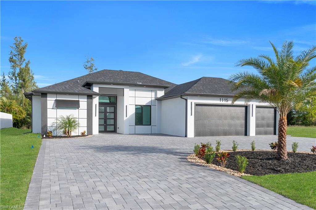 Stunning new construction single-family home located in one of Cape Coral’s most desirable areas. This modern residence sits on an oversized triple lot and features a spacious triple-car garage, offering plenty of room for future projects and expansion. Designed with high-end finishes throughout, this home blends contemporary style with functionality, making it ideal as a primary residence or an income-producing Airbnb.
The property offers 4 bedrooms and 3 full bathrooms, highlighted by a spectacular chef’s kitchen with premium cabinetry, elegant finishes, and a built-in bar—perfect for entertaining. Enjoy serene and tranquil views of the Carnival Canal, creating a peaceful waterfront atmosphere.
The outdoor living area is a true Florida retreat, featuring a covered patio, a heated pool for year-round enjoyment, and a fully equipped outdoor kitchen, ideal for both summer evenings and cooler nights. This home delivers the ultimate Florida lifestyle.
Additional highlights include city water and sewer and not located in a flood zone, providing peace of mind and added value.