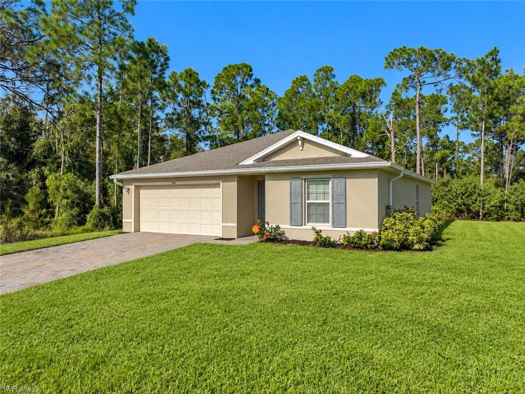 PRICE REDUCED | READY FOR QUICK MOVE-IN | BUILT IN 2024 | NO HOA | BIG PRIVATE BACKYARD 
Beautifully maintained 2024-built home featuring 3 bedrooms, 2 bathrooms, and a 2-car garage. This is a spectacular opportunity to purchase a new Southwest Florida home without the construction wait, and all the extras already included, NEW CEILING FANS AND LIGHT FIXTURES. This move-in-ready home offers an open and inviting floor plan with spacious bedrooms, a modern and fully equipped chef's kitchen, plenty of natural light throughout and gorgeous wide plank CERAMIC TILE (not vinyl) floors. Enjoy beautiful western exposure and stunning Florida sunsets from the comfort of your home or expansive private backyard. The large backyard offers plenty of room for a future pool, privacy fencing, outdoor entertaining, pets, or simply creating your own private oasis. An extended driveway and large 2-CAR GARAGE provide ample parking for residents and guests. 
Situated directly SR-82 at Jaguar Blvd with lots of new development in the area you are also conveniently located approximately 20 minutes from Southwest Florida International Airport (RSW), close to shopping, restaurants, and grocery stores, and approximately 30 minutes to multiple Gulf Coast beaches. With NO HOA, 2024 construction, a spacious backyard, this home is ready for a quick move-in and offers the space, flexibility, and convenience today's buyers are looking for. Come and see what this home and location has to offer today.