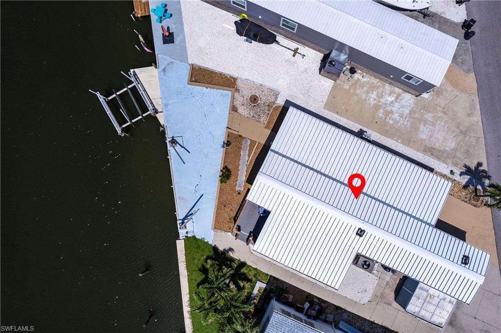 BOATER’S PARADISE! Welcome to this beautifully renovated waterfront home featuring approximately 50 feet of seawall on a wide, deep canal with NO fixed bridges, offering easy access for larger boats and even accommodating a sailboat. Enjoy convenient boating access to some of Southwest Florida’s most beautiful destinations, including Sanibel, Captiva, Cayo Costa, and North Captiva.

This property has been fully renovated with a new roof, new electrical, new plumbing, new flooring, and beautifully tiled bathrooms. Both bathrooms feature showers, and the primary suite offers a spacious walk-in closet. 

With NO HOA, NO age restrictions, and NO rental restrictions, this property offers exceptional flexibility for both personal use and investment. Whether you’re looking for a waterfront getaway, full-time residence, or investment property, this home offers the perfect combination of boating access, modern updates, and freedom.
PID 02-46-22-20-0000D-0310
