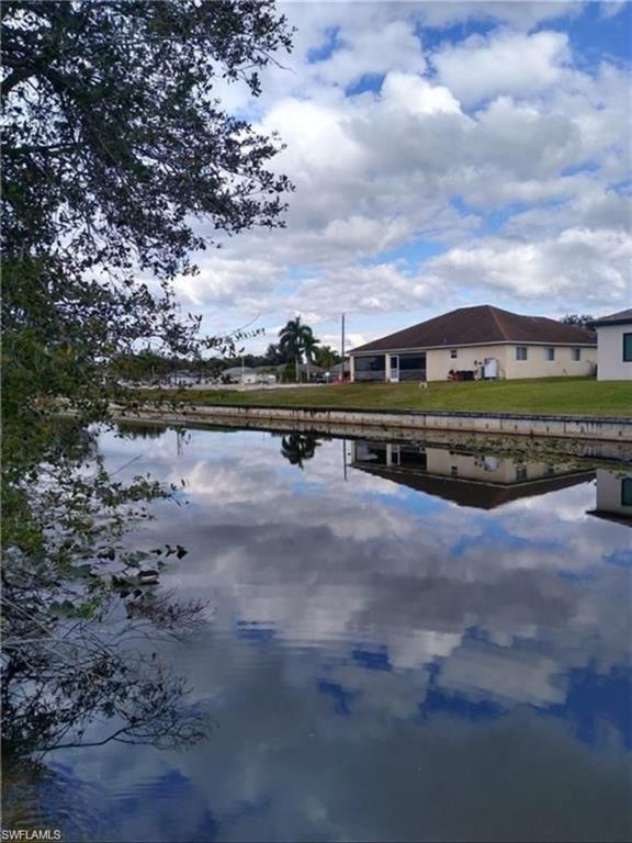 Waterfront residential lot located in north Cape Coral. HUGE CANAL, close to schools, restaurants, shopping and quick commuting to Fort Myers and Punta Gorda. Whether you want to fish right off your backyard or just relax and watch the sunset this southern exposure lot is just right for you! Build now or invest for the future. Lot prices are increasing daily, make sure to secure your piece of paradise today!
