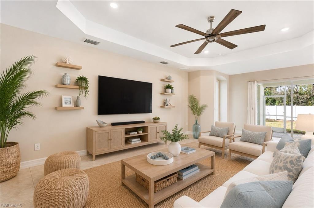 Welcome to effortless Florida living at 3028 Royal Gardens Ave in Lindsford — a move-in ready home designed for both comfort and functionality.

This 4-bedroom plus den, 3.5-bath residence offers a bright, open layout ideal for modern living. The heart of the home features a stylish kitchen equipped with sleek LG appliances, ample cabinetry, and a spacious island that flows seamlessly into the main living and dining areas—perfect for entertaining or everyday gatherings.

The owner's suite is a true retreat, highlighted by a custom-designed closet system that maximizes organization and storage. Thoughtful upgrades continue into the laundry room with added cabinetry and storage, making daily routines simple and efficient.

Designed with convenience in mind, the home includes a dedicated pool bath providing easy access to the outdoor living space and backyard—perfect for future pool plans or entertaining guests.

Located in Flood Zone X (no flood insurance typically required), this home provides additional peace of mind while being just minutes from shopping, dining, the new Lee Health Hospital, downtown Fort Myers, and Southwest Florida’s world-famous beaches.

Residents of Lindsford enjoy a vibrant, amenity-rich community featuring a resort-style pool and spa, clubhouse, tennis and bocce courts, on-site gym, and a welcoming neighborhood atmosphere.

Move-in ready, thoughtfully upgraded, and perfectly located—this home is ready for its next chapter. Schedule your private showing today. One or more photo(s) has been virtually staged, AI generated or rendered.