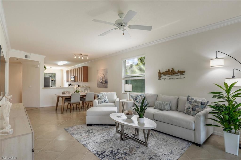 This sensational 2+Den/ 2Bath Colonade end unit was just updated with a light and bright modern décor that is sure to please and  is being sold turkey. It has a southern facing window in the living area and a western and southern view of the Cypress 16 lake, fairway, and the surrounding preserve. The unique characteristics of the Colonade are an oversized outdoor storage closet, a very private guest bedroom/bath, and a large eat in kitchen with lots of storage and counter space. Heritage Bay is not just a residential community; it is a union of the natural beauty of Southwest Florida, and an active luxury resort with amazing lakes, 27 holes of golf, a fun poolside cabana, luxury clubhouse grill room, active tennis, 6 pickleball, bocce programs, and a full service fitness and aerobics center. There are social events galore and the members are friendly and highly active. Every day is like a vacation with friends, and every property owner is a golf member.  Building is located within walking distance to all amenities.