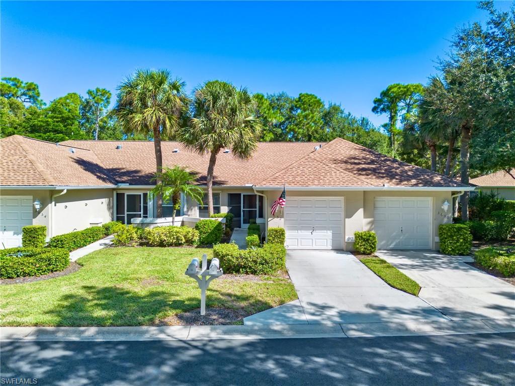 Welcome to The Villas at Timber Lake in Fountain Lakes, a sought-after gated community in centrally located Estero. This turnkey villa features two bedrooms, two bathrooms, and a one-car garage. Tile and wood flooring runs throughout, while soaring vaulted ceilings enhance the sense of space and natural light. Designer wall mirrors and an enclosed sunroom add distinctive appeal, and the primary bathroom was recently updated. Outside, enjoy an open patio surrounded by lush landscaping. Residents and guests have unlimited access to a par-3 golf course, along with a community pool, fitness center, tennis, bocce, shuffleboard, pickleball, basketball, fishing lakes, lakeside walking paths, billiards, a library, and a full calendar of events and sports leagues. Discover an active social lifestyle and a place to call home at Fountain Lakes.