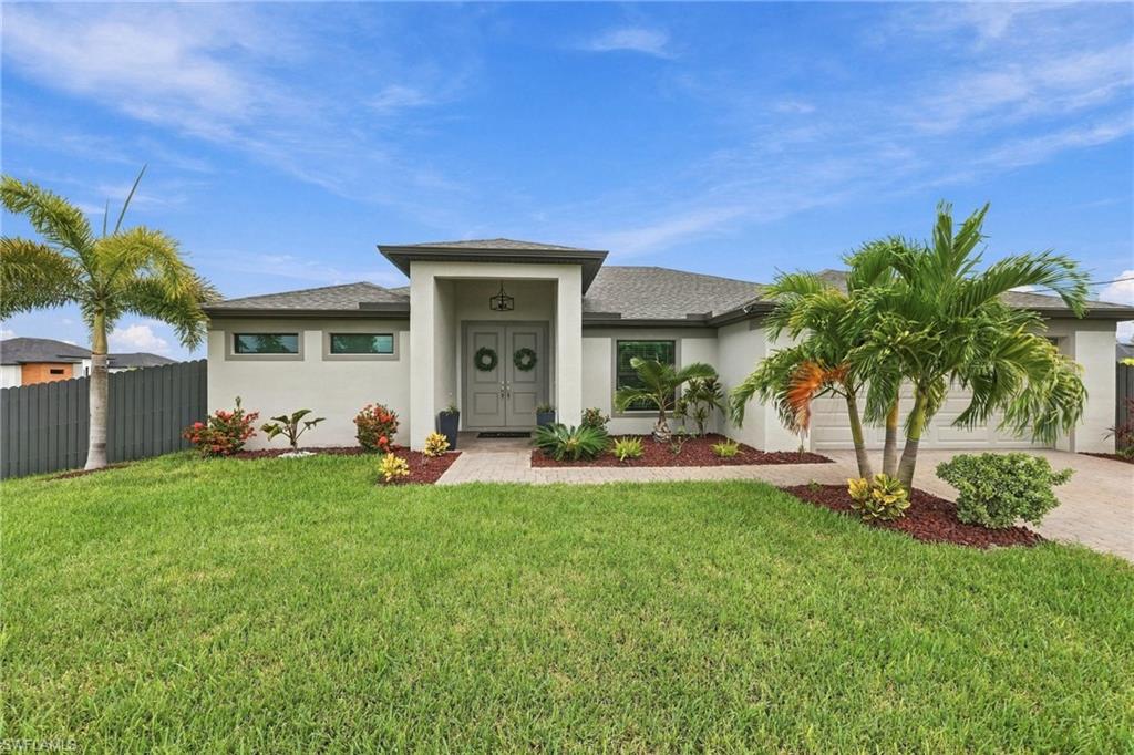 NEW TO MARKET & PRICED TO SELL! Built in 2023, this beautifully maintained 3-bedroom plus den, 2-bath home is ideally located in Northwest Cape Coral, just minutes from the future Seven Islands project. Close to shopping, dining, and everything the area has to offer. Situated on a desirable corner lot with a large yard with a privacy fence, this home offers plenty of space both inside and out. The open floor plan features ceramic tile throughout, granite countertops, built in custom entertainment center, impact resistant windows and doors and a spacious screened-in lanai perfect for enjoying the Florida lifestyle. A whole-house reverse osmosis system provides purified water throughout the home, while an 18,000-watt generator conveys with the property and is capable of powering the entire home. The oversized screened lanai is the perfect place to relax, equipped with an outdoor shower and a spa which is included in the sale of the home. Even better, all furniture and decor on the lanai is included. Whether you’re looking for a full-time residence, vacation home, or investment property, this Northwest Cape Coral gem checks all the boxes. Don’t miss your opportunity to make this one yours just in time for the holidays!