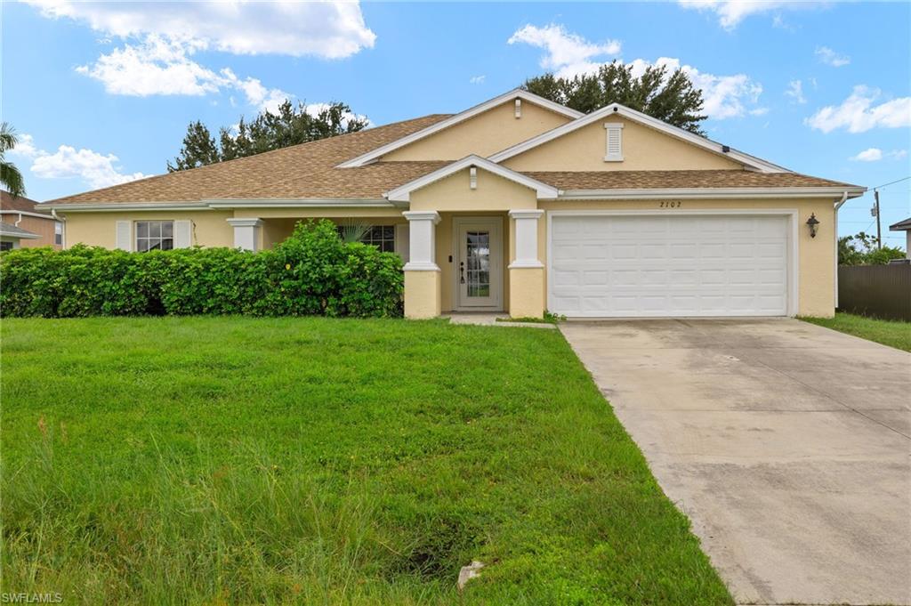 Welcome to this charming 3 bedroom, 2 bathroom home in the desirable location of Cape Coral, FL. This house features an oversized den/media room that can easily be converted into a 4th bedroom. The all-new wood flooring adds a touch of elegance to the spacious living areas. The huge master bedroom boasts a massive walk-in closet, perfect for all your storage needs. Step outside to the large wrap-around lanai, ideal for enjoying the Florida sunshine or hosting outdoor gatherings. The spacious backyard provides plenty of room for outdoor activities or gardening. With its great location near shopping centers and schools, this home is perfect for anyone looking for convenience and comfort. Don't miss out on this fantastic opportunity to make this house your new home!