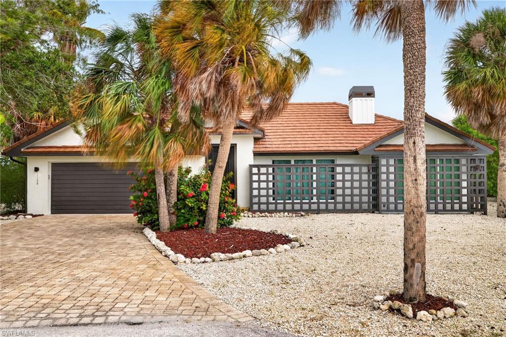 Welcome to 1339 Par View Drive, a beautifully reimagined Sanibel residence offering exceptional privacy, expansive water and golf course views, and the peace of mind of a COMPLETE REMODEL DOWN TO THE STUDS. Thoughtfully redesigned for today's lifestyle, this 3-bedroom home with dedicated office features impact-resistant windows and doors, a tile roof, NEW HVAC, beautifully updated interiors and exceptional indoor-outdoor living.

Tucked at the end of a quiet cul-de-sac in desirable Beachview Country Club Estates, the home enjoys a spectacular setting overlooking the lake and golf course beyond. Step inside to a light-filled, open interior where vaulted and beamed ceilings, generous windows and glass doors create an inviting sense of space while showcasing the beautiful outdoor setting.

The remodeled kitchen is both stylish and functional, featuring crisp white cabinetry, expansive countertops, stainless steel appliances and excellent workspace. Its open design connects naturally with the living and dining areas, making the home equally comfortable for everyday island living or entertaining family and friends.

The flexible floor plan includes three bedrooms plus a dedicated office, providing plenty of room for guests, working from home or creating a private den. The primary suite offers a peaceful retreat, while beautifully updated baths, a separate laundry room, powder room, abundant storage and an attached two-car garage add convenience throughout.

Outdoor living is truly the centerpiece of this property. An expansive screened lanai surrounds the private pool and spa, creating your own tropical retreat overlooking the tranquil lake and golf course. A spacious covered area with a distinctive wood-detailed ceiling provides plenty of room for outdoor dining, entertaining or simply relaxing in the shade. Start the morning with coffee overlooking the water, spend the afternoon poolside and end the day enjoying the colors of a Sanibel sunset from your own backyard.

The end-of-cul-de-sac location provides a wonderful sense of privacy while placing you close to the very best of Sanibel. Enjoy easy access to the island's beautiful beaches, miles of bike paths, golf, restaurants, shopping and the relaxed pace that makes Sanibel such a special place to call home. Whether this becomes your full-time island residence or a seasonal retreat, 1339 Par View Drive offers the rare combination of a beautifully remodeled home, private pool and spa, exceptional views and a location that makes it easy to enjoy the Sanibel lifestyle every day.