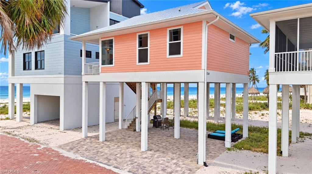LOCATION, LOCATION, LOCATION! BRAND-NEW LUXURY GULF-FRONT BEACH HOME on the highly desirable North End of Fort Myers Beach! This exceptional new-construction residence combines an irreplaceable beachfront location, spectacular Gulf views, luxury finishes, and outstanding weekly rental potential all just steps from the heart of Fort Myers Beach.

Built new and elevated approximately 21 feet, this stunning coastal home has been thoughtfully designed for modern beachfront living. Offered TURNKEY and beautifully finished throughout, the residence showcases upscale finishes, an open and inviting floor plan, and breathtaking views of the Gulf of Mexico creating the perfect setting for enjoying unforgettable Florida sunsets from your own beach home.

Step outside and experience the ultimate Fort Myers Beach lifestyle with the Gulf and white-sand beach directly at your doorstep. Located on the sought-after North End, you are just a short walk from Times Square, Margaritaville Beach Resort, restaurants, shopping, entertainment, and everything downtown Fort Myers Beach has to offer.

WEEKLY RENTALS ARE ALLOWED and there is NO HOA, creating an exceptional opportunity for buyers seeking a luxury vacation rental, second home, or full-time beachfront residence. The combination of brand-new construction, elevated design, turnkey furnishings, Gulf-front location, and walkability to the island's most popular destinations makes this property an outstanding investment opportunity.

Whether you're searching for a luxury beach retreat or an income-producing vacation property, 724 Estero Boulevard delivers the LOCATION, LIFESTYLE, and INVESTMENT POTENTIAL that make Fort Myers Beach so desirable.

BRAND NEW. GULF FRONT. ELEVATED. TURNKEY. WEEKLY RENTALS. NO HOA. NORTH END LOCATION. This is the Fort Myers Beach opportunity you've been waiting for!