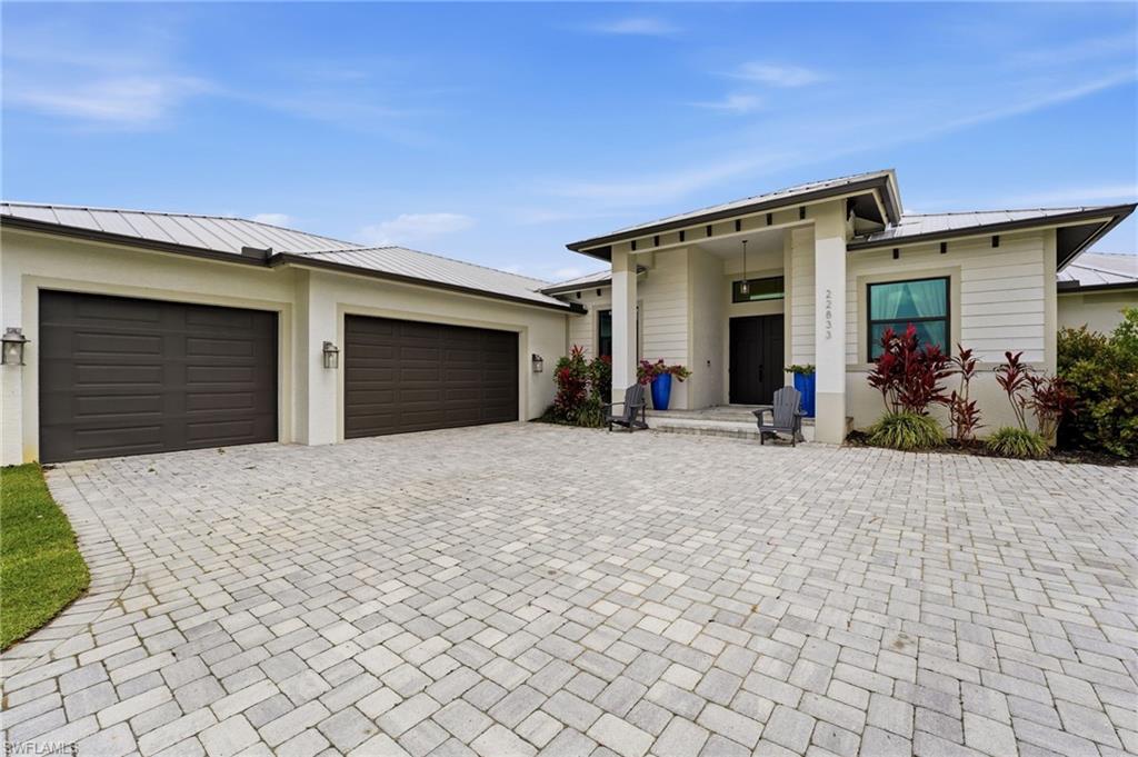 1.65 ACRES, DIRECT GULF ACCESS, LOW HOA FEES, AND NEWER CONSTRUCTION! This is not your typical HOA community. Set within Caloosa Preserve, a community designed around space, privacy, and large homesites, this exceptional waterfront property offers a rare combination of 1.65 acres, newer construction, and direct access to the Gulf. Built in 2022 and positioned along the Caloosahatchee River, this is the kind of Southwest Florida property that gives you room to spread out while still enjoying the waterfront lifestyle.

A long paver driveway leads through the expansive property to the home and oversized three-car garage. Inside, the 4-bedroom plus den, 3-bath layout offers plenty of room for everyday living and entertaining, with high ceilings, an open kitchen and living area, a dedicated den, large laundry room, and walk-in closets in every bedroom. The newer construction means you get the modern finishes, design, and functionality buyers are looking for without giving up the acreage that is becoming increasingly hard to find.

And then there’s the waterfront.

Step outside to your own private backyard retreat with a resort-style pool and spa, large tanning ledge, and bubbler, all completely open to the surrounding landscape without a pool cage. Beyond the pool, your private dock and boat lift put the Caloosahatchee River right at your doorstep, giving you direct Gulf access for boating, fishing, and days spent on the water.

What makes this property truly special is the lifestyle. You can have acreage, privacy, a private dock, a pool, and newer construction, while still being part of a community with low HOA fees. Caloosa Preserve offers something you don’t typically find in an HOA community: SPACE. Large parcels, privacy, and a more open, natural setting instead of homes stacked closely together.

If you’ve been looking for a Southwest Florida home where you can spread out, keep a boat at your own dock, enjoy the pool, and actually have some breathing room around you, this one deserves a look.