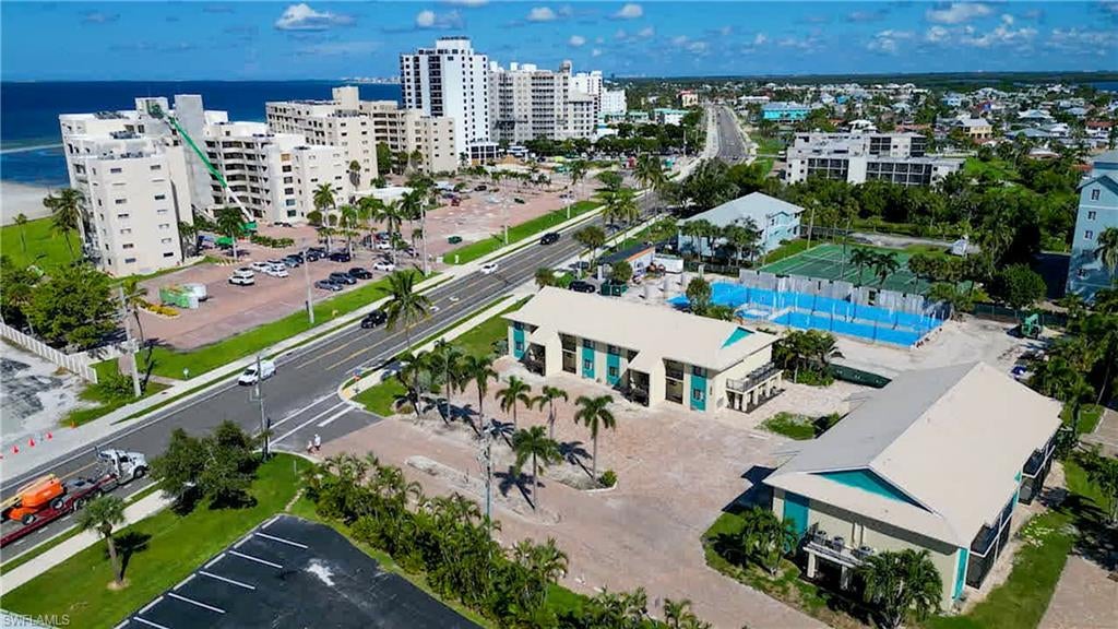 Live the Fort Myers Beach lifestyle in this fully renovated, first-floor corner end condo at Bac-Bay Health & Racquet Club, on the quiet, highly sought-after south end of the island. Cross the road to the beach for morning walks, Gulf of America sunsets and shelling, then stroll or bike to Santini Plaza for dining, shopping and everyday conveniences. Whether you're looking for a second home, a primary residence or a seasonal rental on one of Southwest Florida's favorite islands, this 2 bed, 2 bath, 811 sq ft condo delivers easy, low-maintenance beach living with a low HOA of only $485/month.

Completely reimagined from top to bottom, the condo features elegant tile flooring throughout and a modern kitchen with quartz countertops, stainless steel appliances and sleek contemporary cabinetry. Both fully updated bathrooms have quartz countertops and upscale fixtures for a spa-like feel, and the split-bedroom layout gives owners and guests privacy.

Built for island living and peace of mind, the condo has impact windows, storm impact sliding doors over the screened lanai, flood barriers and a brand-new A/C system, plus new landscaping and a privacy fence.

Condo living here means resort-style amenities without the upkeep: two community pools plus tennis and pickleball courts. The association allows up to 12 leases a year with a 30-day minimum, ideal for capturing Fort Myers Beach's strong seasonal rental demand, and pets up to 25 lb are welcome.

Turnkey, upgraded and just steps from the sand, this is your chance to own a piece of Fort Myers Beach. Schedule your private showing today.