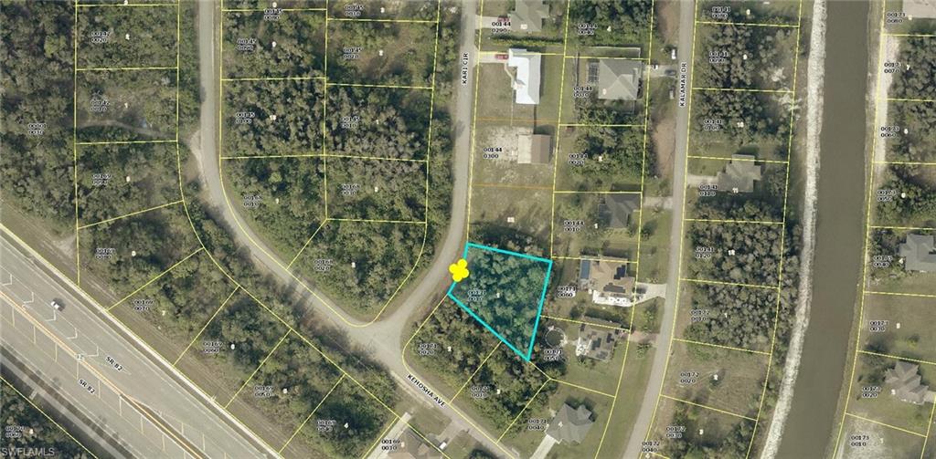 Prime oversized lot located in one of the fastest-growing areas of Lehigh Acres! This spacious homesite offers the perfect opportunity to build your dream home or invest in a rapidly developing neighborhood. Conveniently situated off State Road 82, providing easy access to Fort Myers, shopping, dining, and entertainment. Exciting growth is underway with a new Lowe’s Home Improvement shopping center currently in permitting nearby adding even more value to this location. Don’t miss your chance to secure land in a high-demand area before prices rise!