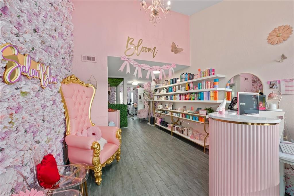 BEAUTIFULLY REMODELED BOUTIQUE SALON | FOR LEASE | FORT MYERS
Rare opportunity to lease a beautifully remodeled, turnkey boutique salon in a convenient Fort Myers location. Offered at $3,500 per month, this professionally designed space features a bright, modern aesthetic and is ideal for an established salon operator or beauty professional looking to open or expand without the expense and hassle of a full build-out.
The salon features a welcoming reception area, retail display shelving, multiple styling stations, shampoo bowls, and an open, functional floor plan. Additional private areas offer flexibility for esthetics, massage, nails, lashes, makeup, and other beauty or wellness services.

The space is partially furnished, with shampoo bowls and select furnishings included, providing an excellent foundation to begin operations quickly. Large storefront windows provide abundant natural light and visibility, while convenient parking offers easy access for clients and staff.

Contemporary lighting, custom décor, and distinctive finishes create an inviting, upscale atmosphere and memorable client experience. This is a unique opportunity to lease a beautifully appointed boutique salon in Fort Myers without starting from a traditional commercial shell.

Shampoo bowls and select furnishings are included. Salon business, additional equipment, supplies, and personal property are not included unless otherwise agreed.

Opportunities to lease a fully built-out salon space like this are hard to find. Schedule your private showing today and see firsthand everything this beautiful space has to offer. Bring your vision, your clients, and your business—this salon is ready for its next chapter!