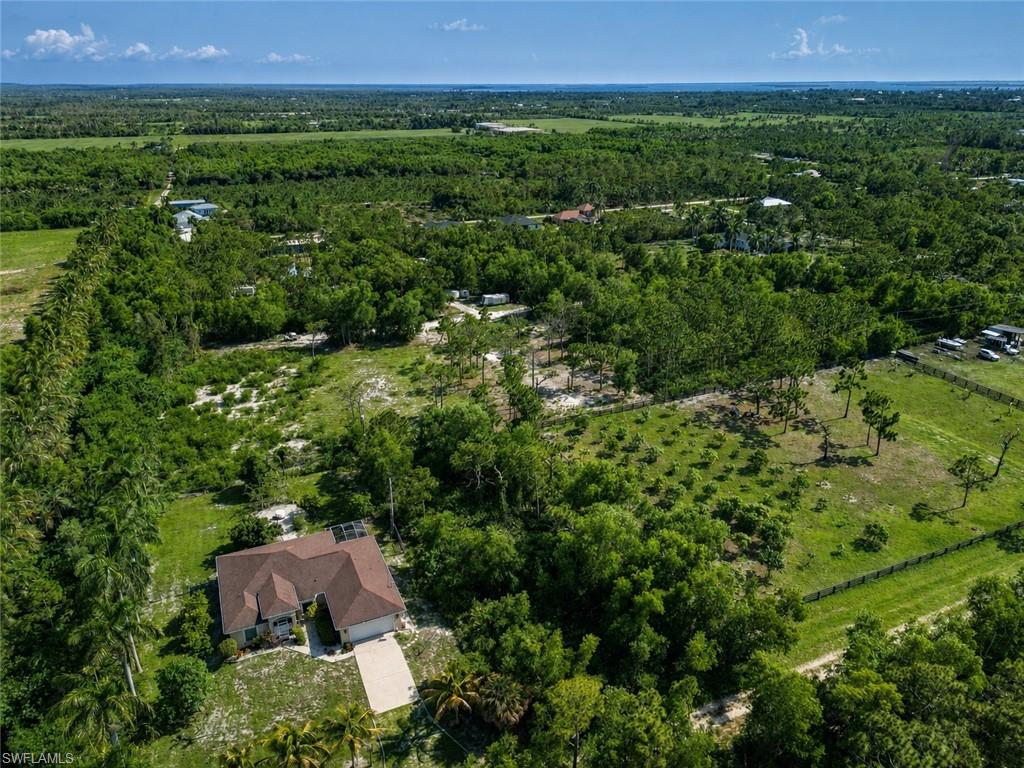 Escape the ordinary and create your own slice of Old Florida on this beautifully wooded half-acre parcel in Bokeelia. Tucked away on Hodges Drive, the property offers a wonderful sense of seclusion, surrounded by mature tropical vegetation and the natural beauty that makes Pine Island so special. Imagine creating a private island retreat where mornings begin beneath the palms, wildlife replaces traffic noise, and there is room to slow down and enjoy your surroundings.

Life on Pine Island is all about the outdoors. Spend your days boating, fishing, kayaking, birdwatching, or exploring the waters of Pine Island Sound and Charlotte Harbor. The Bokeelia Fishing Pier and boat ramp provide access to some of Southwest Florida’s most popular fishing and boating destinations, including Boca Grande Pass, Cayo Costa and the surrounding outer islands. When you are back on land, enjoy fresh local seafood, island shops, art galleries, tropical fruit farms and the relaxed small-town character Pine Island is known for.

Whether you envision a custom home, seasonal getaway or a piece of island property to hold for the future, this property offers the privacy of a secluded setting with the boating, fishing and coastal lifestyle of Bokeelia close at hand. Bring your plans and begin your next chapter on Pine Island.