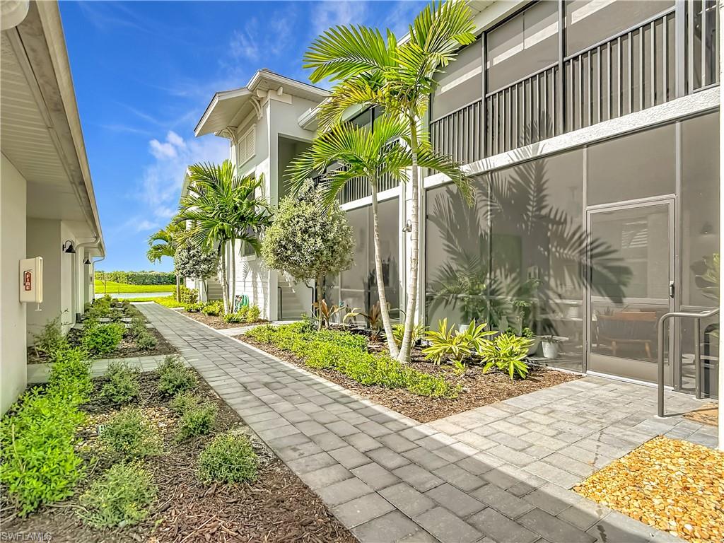 Welcome to The National Golf & Country Club in Ave Maria, where every day feels like a vacation. This 2+Den, 2-bath DiAngelo model offers 1,366 sq ft of clean, functional living space. The open layout is exactly what buyers want, bright connected living, dining, and kitchen spaces that feel larger than the square footage and are perfect for entertaining or easy day-to-day living. You get both a front and rear screened lanai, enjoy morning coffee in the front, evening views over the golf course in the back. Positioned with desirable golf and lake views, this home gives you that peaceful backdrop. A one-car garage adds practical storage, and the real value is in the lifestyle. Ownership includes social membership that includes resort-style amenities with a zero-entry pool with lap lanes, poolside bar and grill, tennis, pickleball, bocce, fitness center with aerobic and stretching rooms, saunas, full-service spa, and a newly completed clubhouse with fine dining, bar and grill, and social activities. Residents also enjoy all the amenities Ave Maria has to offer including parks, walking paths, shopping, dining, and more.