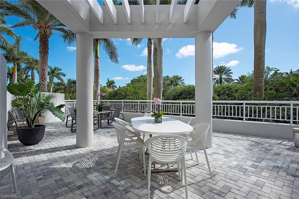 Tropical, lush landscaping greets you from the moment you enter this light-filled, second-floor residence. A deeded 1,600-square-foot open-air terrace, equipped with a gas grill, inspires endless possibilities for creating your exclusive outdoor oasis. Easily access the pool, beach and garage parking spaces from your private gate, which is also ideal for taking your pet for a walk without having to go through the building. These special features offer a unique blend of luxurious high-rise living and the feel of a single-family home. Spanning over 3,300 square feet, this desirable floor plan includes three bedrooms and 3.5 baths, 10-foot ceilings and two screened and shuttered lanais. Provence is gated and offers world-class amenities, including 24-hour security, fitness center, tennis courts, three guest suites, a pool overlooking the Gulf and is ideally located directly across from Venetian Village.