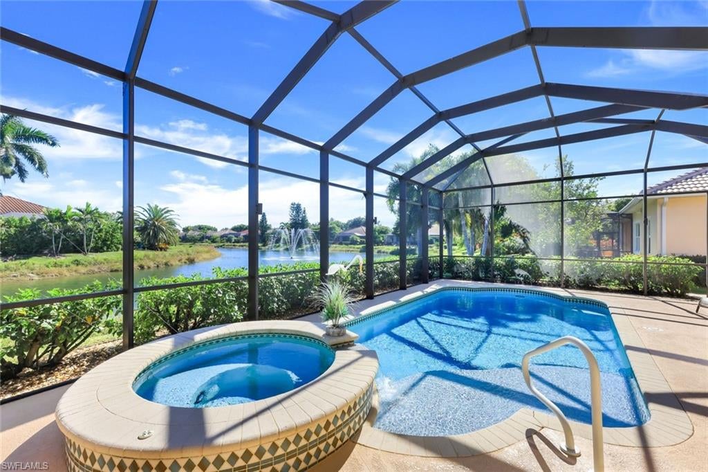 Welcome home to this stunning Deville Grand Model, 4 bedroom and 4 bath pool home with over 2900 square feet under air, located in Fairwinds of Bonita Springs. Major home improvements include: Roof, gutters & downspouts (2020), new water heater (2023), newer AC units (2018), storm shutters for the enclosed lanai (2014), garage door opener (2022), kitchen disposal (2018), lanai slider track replacements (2022), freshly refurbished lanai cage with new Phifer fiberglass screening (2022), recoated lanai furniture framing/sling backs (2016), Pentair SuperFlo 1.5 HP pool pump (2020), Jandy variable-speed FloPro pump (2025), and Aqualink control system (2025).  It all begins with the custom pool and spa with long, picturesque lake views.  This beautifully maintained and thoughtfully upgraded home offers spacious, elegant living with tray ceilings, tile flooring, granite countertops, custom glazed cabinetry, and upgraded appliances throughout. The expansive gourmet kitchen is perfect for the chef at heart, complete with a cooktop, double ovens, oversized refrigerator, and a large island ideal for meal prep and entertaining. The home offers a desirable split-floor plan with a private primary suite and a separate guest wing featuring two bedrooms and a full bath. Multiple living spaces include a formal living and dining area, along with a comfortable family room off the kitchen. Large sliding glass doors open to the screened lanai, where the custom pool, spa, and serene lake backdrop create the perfect setting for outdoor enjoyment. The seller is including garage shelving and cabinets, four mounted TVs, a small refrigerator, a small freezer, and a gas/LP generator professionally wired to power the entire home—including the AC system! Additional features include impact glass on all windows and doors and low HOA fees!. This home has been meticulously cared for and is priced to sell. A rare opportunity to own a beautifully upgraded lakefront home—truly a must see!