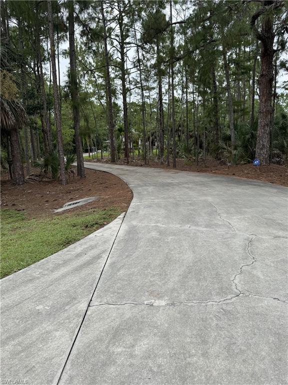 Here is a unique nonprofit real estate opportunity in Naples, Florida. A charter school recently purchased four homesites totaling 17 acres at Vanderbilt Beach Road and 7th Ave NW then constructed a school campus. Directly adjacent to the east, there are 8 contiguous properties-including 6 of my listings and neighboring brokerages-comprising a total of 27.5 acres. Together, these properties offer a substantial parcel of contiguous land on a major thoroughfare (Vanderbilt Beach Road, Collier Blvd, and 7th Ave NW). located directly across from a thriving shopping center. Key property details include: - Utilities: New sewer and water connections are available on Vanderbilt Beach Road. Development Potential: Ideal for facilities with right-of-way development rights without requiring re-zoning (Nonprofit such as a hospital or school), or for a developer willing to pursue a zoning change with the county. Seller Status: All 8 property owners are aligned.