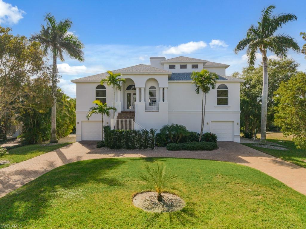 Panoramic Gulf views and unforgettable sunsets await you from the 3rd floor & balcony of this beautifully maintained coastal retreat, ideally located just steps from the Tigertail Beach entrance on an oversized parcel. The residence offers rare privacy with preserve views, while still capturing Gulf & beach high-rise vistas from the upper level. The home features 3 bedrooms, 4 baths, a den (easily converted to the 4th BR by adding a closet), and multiple living spaces across three levels, all accessible by a private elevator with updated equipment. The open-concept main living level showcases volume ceilings, abundant natural light, and an updated kitchen with newer stainless steel appliances & backsplash flowing into the spacious great room. Outdoor living shines with an expansive lanai, no-see-um screens, and a private saltwater pool with newer heater, pump, and salt cell—perfect for entertaining. Elevated CBS construction places the first living level 21' above ground, offering peace of mind along with impact glass, shutters, and a whole-house generator with 1,000-gallon propane tank. Additional highlights include a 6-car garage with high ceilings, mini-split A/C and storage, two A/C systems, two electric water heaters, new flat roof membranes (2025), all-new exterior paint (late 2025), outdoor shower, new fenced pet area, whole-house water purifier, and meticulously maintained systems. A rare opportunity to enjoy privacy, elevation, and Gulf views in a truly exceptional beachside neighborhood, perfect for you and yours or for the investor considering an excellent house & location for future tenants.
