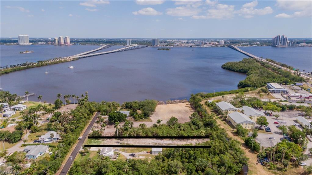 Affordable land near the action! Build your Southwest Florida home on this cleared and filled ½-acre residential lot in North Fort Myers, just across the Caloosahatchee River from Downtown Fort Myers and the historic River District. With approximately 63 feet of frontage and more than 350 feet of depth, this homesite offers plenty of room to bring your plans to life and create your own Florida lifestyle. The previous home has already been removed, the property is zoned residential, there is no HOA, and a survey is available. This location puts you close to some of the exciting growth happening along the Fort Myers riverfront, including Lofton Island, Legacy Island Park and the newly redeveloped Legacy Harbour Marina. Legacy Island is being developed as a recreational boating destination, while Legacy Harbour brings 131 modern slips back to the downtown waterfront. Closer to home, Marinatown Yacht Harbor offers that laid-back Southwest Florida lifestyle with waterfront restaurants, tiki bars, live music, boating, and dock-and-dine options just minutes away. Whether you're looking for vacant land near Downtown Fort Myers, an affordable Florida homesite, or a residential lot near the Caloosahatchee River, 1069 River Road puts you close to boating, dining, entertainment, and the growing Fort Myers waterfront, without the downtown price tag.