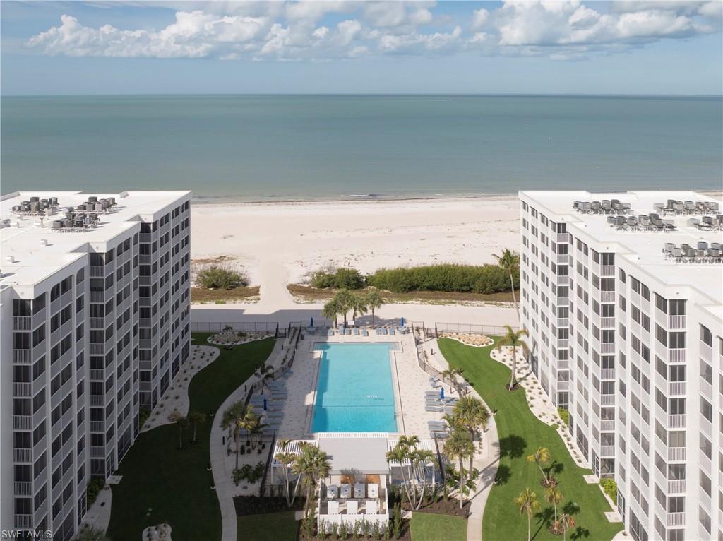 Welcome to this beautifully updated 2-bedroom, 2-bathroom residence in the desirable Creciente North building on the south end of Fort Myers Beach. This gulf-front condominium offers direct beach access, resort-style amenities, and a spacious floor plan designed to capture the beauty of the coastline.

Inside, the condo features an open layout with new sliding glass doors leading to an oversized balcony showcasing wide views of the Gulf of Mexico. The remodeled kitchen includes updated cabinetry, new countertops, and attractive lighting, flowing seamlessly into the dining area and comfortable living room—ideal for relaxing or entertaining.

Upon entering, a convenient laundry room with washer and dryer sits to the left. The main living area opens to the expansive balcony, offering plenty of room for outdoor dining and lounging while enjoying the coastal breeze.

The primary bedroom features a king-sized bed, private balcony access, and an updated en-suite bathroom with a walk-in shower. The guest bedroom also offers a king-sized bed, balcony access, and a beautifully updated guest bathroom nearby.

Creciente continues to shine with significant community improvements, including brand-new tropical landscaping around the pool, creating a lush, resort-style atmosphere. Residents enjoy a fitness room on the ground floor, a community room with a pool table, and a secure lobby with coded access for peace of mind. Monthly rentals are permitted, offering excellent flexibility for owners.

Step outside and enjoy the sparkling pool or stroll directly to the beach. This north-facing unit captures those iconic Fort Myers Beach sunsets. Directly across the street, Santini Marina Plaza now features newly opened shops and restaurants, adding convenience and charm to the neighborhood. While the south end of the island continues to rebuild, the progress is impressive, and the area is once again vibrant and full of life.

A wonderful opportunity to own a beautifully updated gulf-front condo in a community that continues to thrive.