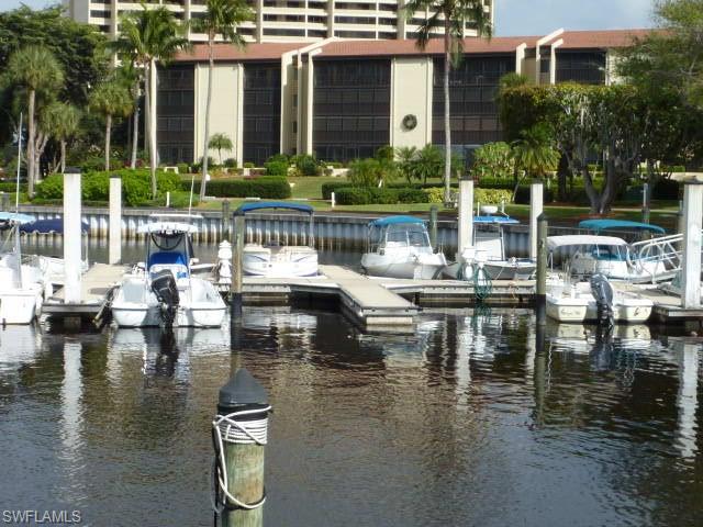 LOCATION!!  Marina and river views from this envious WATERFRONT location. The spacious great room floorplan boasts two bedrooms and bathrooms, screened, tiled and storm protected lanai, gifting bright daylight all day and gorgeous sunsets.  Take a walk through with the Mattaport visual tour!
 Units in this prime location in Clipper Cove rarely become available to the public.  Updates to this elevator-accessed 2nd floor unit include the kitchen with granite counters, white painted cabinets, tray ceiling, wall oven and wine refrigerator.  Renovated baths with tiled walk-in showers, frameless glass, newer granite topped wood vanities and cabinetry and bright lighting.  The primary bedroom has loads of closet space.  Convenient under building parking with storage closet.  OFFERED TURNKEY!  This community is in a great location, nestled off historic, palm-lined McGregor Blvd and minutes to Ft Myers Beach, Sanibel, great shopping, live theaters, Florida SW State University, RSW airport, renowned medical centers, and the vibrant downtown river district. The Landings Yacht, Golf & Tennis Club offers a truly active lifestyle within a gated, waterfront country club community. Enjoy deep-water Gulf access—no bridges—on the sparkling Caloosahatchee River, part of the Intracoastal Waterway that connects the Gulf of Mexico to the Atlantic Ocean.
Your affordable monthly club fee unlocks a resort of amenities: challenge yourself on an 18-hole golf course, play tennis on 13 Har-Tru courts lit for night games, and try your hand at pickleball on 8 dedicated courts. Take advantage of wet or dry marina slip for boats up to 65 feet, relax at waterfront picnic areas, dine in two exclusive restaurants, and socialize at the clubhouse. Stay fit in the state-of-the-art fitness center, swim in the heated & chilled resort and lap pool, or enjoy bocce and more.
This is more than a home—it’s a lifestyle, a community, and a chance to live every day like you’re on vacation. Discover for yourself why The Landings is Southwest Florida’s best kept secret, and seize the opportunity to make this spectacular condo your forever home or idyllic escape to paradise.