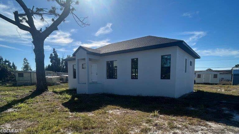 New Construction Situated on an oversized parcel of land - .318 acres...... Fenced with a gate....... Concrete block construction with all Hurricane Rated/High Impact Windows and Doors....... Quartz Countertops...... Vinyl Wood Plank flooring throughout....... White, solid wood, shaker style cabinets....... 3 bedrooms, 2 full bathrooms and 1,230 sq feet of living area.......No HOA or Restrictions or fees..... Seller will get creative regarding financing - Seller Financing is possible!............