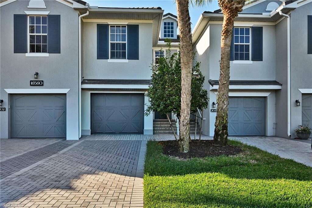 Looking for a Golf Paradise in SW FL at an unbelievable price? Look No Further than Ashton Oaks at River Hall Country Club! This massive 3 bedroom TURNKEY townhome is waiting for a new owner to experience all that River Hall and Southwest Florida have to offer! Large Screened-in Lanai overlooking a long canal, just off the 17th Fairway. 1-Car garage with private driveway and ample guest parking around the private pool and hot tub - the only one in all of River Hall! Your golf is bundled, included, and has NO initiation fee or Food & Beverage minimum! Over 2000 sq ft of living space with double height ceilings gives you a luxury home feel but the price tag of a condo. Plantation shutters on all windows, water views from kitchen, lanai, and your massive primary bedroom. Move right in as all furnishings are included and hardly used. The guard gated community of River Hall not only features a championship 18-hole golf course, but also a 3-hole 'short course', 2 driving ranges, 2 practice greens, and 2 chipping areas. Residents also have access to a casual restaurant just off the pro-shop, a heated resort pool and bar/grille to eat lunch and dinner! Live music, happy hour, food truck nights, mens' and womens' leagues, bocce ball leagues, pickleball leagues and so much more. The River Hall Town Center also has a 2nd floor gym and fitness room, a billiards table around the other MASSIVE resort pool, lighted tennis courts, 8 lighted pickleball courts, basketball court and open soccer field. Not to mention - River Hall Elementary is just outside the gates if you have little ones! Country living yet only a few minutes to Publix, Aldi, Riverdale High School - 20 minutes to the shops and restaurants of Babcock Ranch. HOA Fee includes your Cable, Internet, Water, Sewer, Trash and landscaping. Pet friendly and all ages.