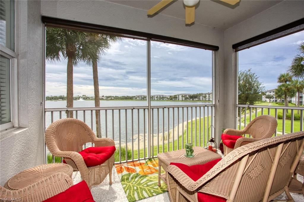 Welcome to this inviting Brookside model, perfectly situated on the second floor to capture spectacular lake views. Located in the highly sought-after Heritage Palms Golf & Tennis Community, this home is offered turnkey—move right in and start enjoying the Florida lifestyle. The bright, open layout is filled with natural light, featuring a kitchen bay window and sliding glass doors that open to the lanai. The lanai is open on two sides, offering panoramic views of the lake, clubhouse, and lighted fountain—the perfect backdrop for serene mornings or relaxing evenings. Wake up to glowing sunrises and savor cooler afternoons on your private retreat. Updates include a new AC (March 2025) for peace of mind, and the combination of tile and carpet flooring has been recently cleaned and well maintained. Heritage Palms is a gated country club community offering bundled golf and tennis, three on-site dining venues, and an array of resort-style amenities. Ideally located near SWFL International Airport, pristine beaches, shopping, and dining, this community delivers both lifestyle and value.