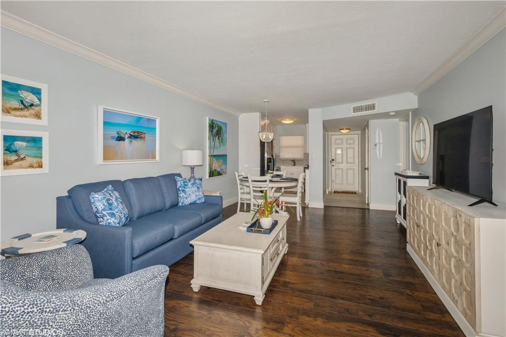 GORGEOUS - LAKE & GOLF COURSE VIEWS - REMODELED - RESORT STYLE AMENITIES - TWO Bedroom, TWO Bath Condo in TURTLE LAKES GOLF COLONY. This condo has fabulous upgrades including: Open Floor Plan, Wood & Tile Floors, Upgraded Kitchen Cabinets with Gorgeous Countertops, Manual Hurricane Shutters, Crown Molding, High Baseboards, New Dishwasher, Whirlpool Appliances, Huge Walk In Closet, Upgraded Bathrooms with High Profile Sinks, Extra Storage and Updated Lighting. The 2nd BR has Two Closets. The Master Bedroom - King Bed, 2nd Bedroom - Queen Bed, Main Area - Gorgeous Pull Out Sofa. Common Laundry. This Beautiful Condo is located on the Quail Run Golf Course which you can play because it is a Public Course and no membership is required. TURTLE LAKE GOLF COLONY offers many amenities, including: HEATED Salt Water Swimming Pool, Sauna, Exercise Room, Library, Bocce Court, BBQ Grills, Shuffleboard, Tennis & Pickleball Courts, Billiards and a Renovated Clubhouse. TURTLE LAKE is located close to everything... Publix, Costco, Restaurants, Movie Theaters, Starbucks and of course Naples Beautiful Beaches.